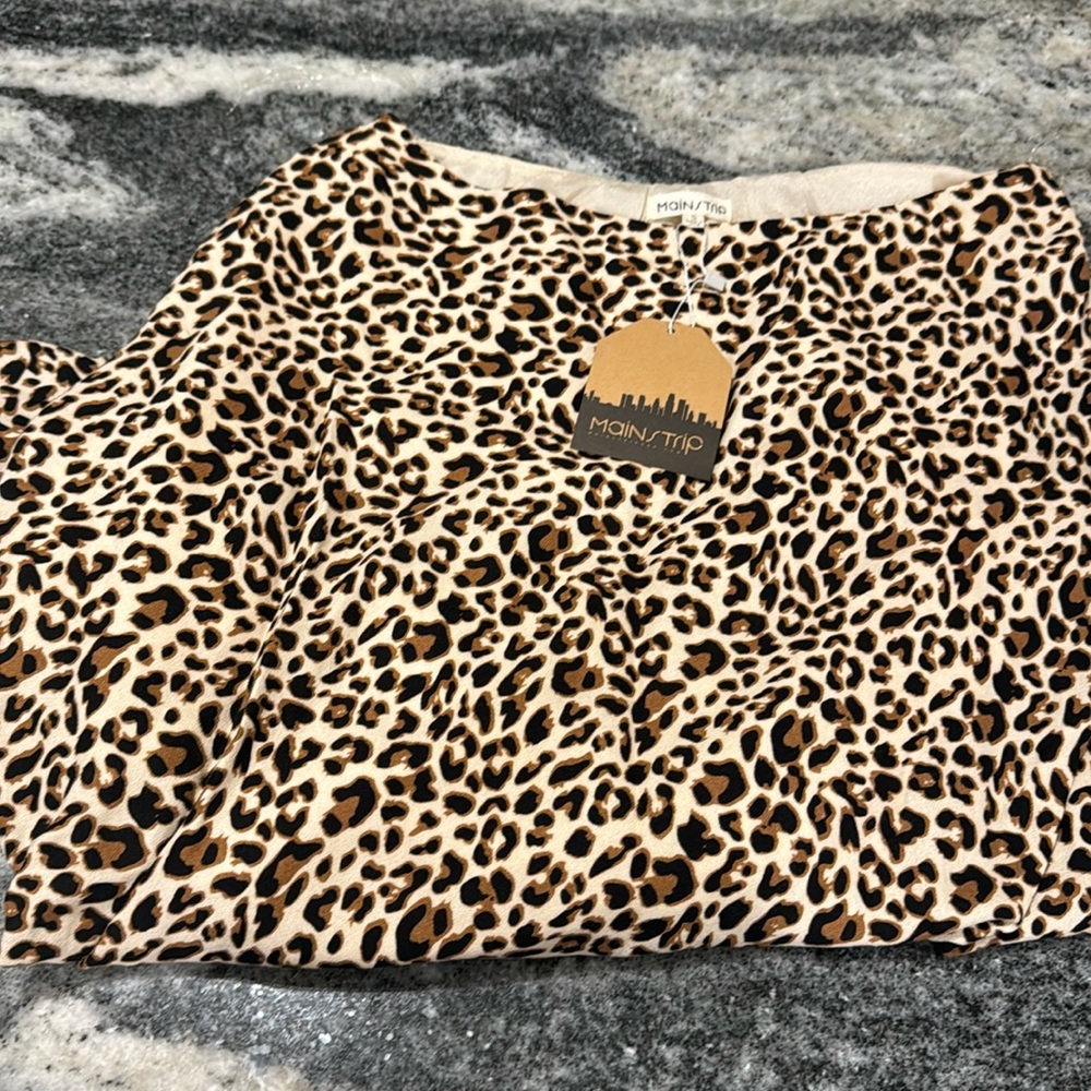 Asymmetrical off the shoulder cheetah top